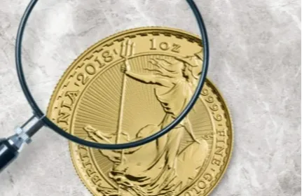 Wat is de verkooppremie op goud en wat is de spread?